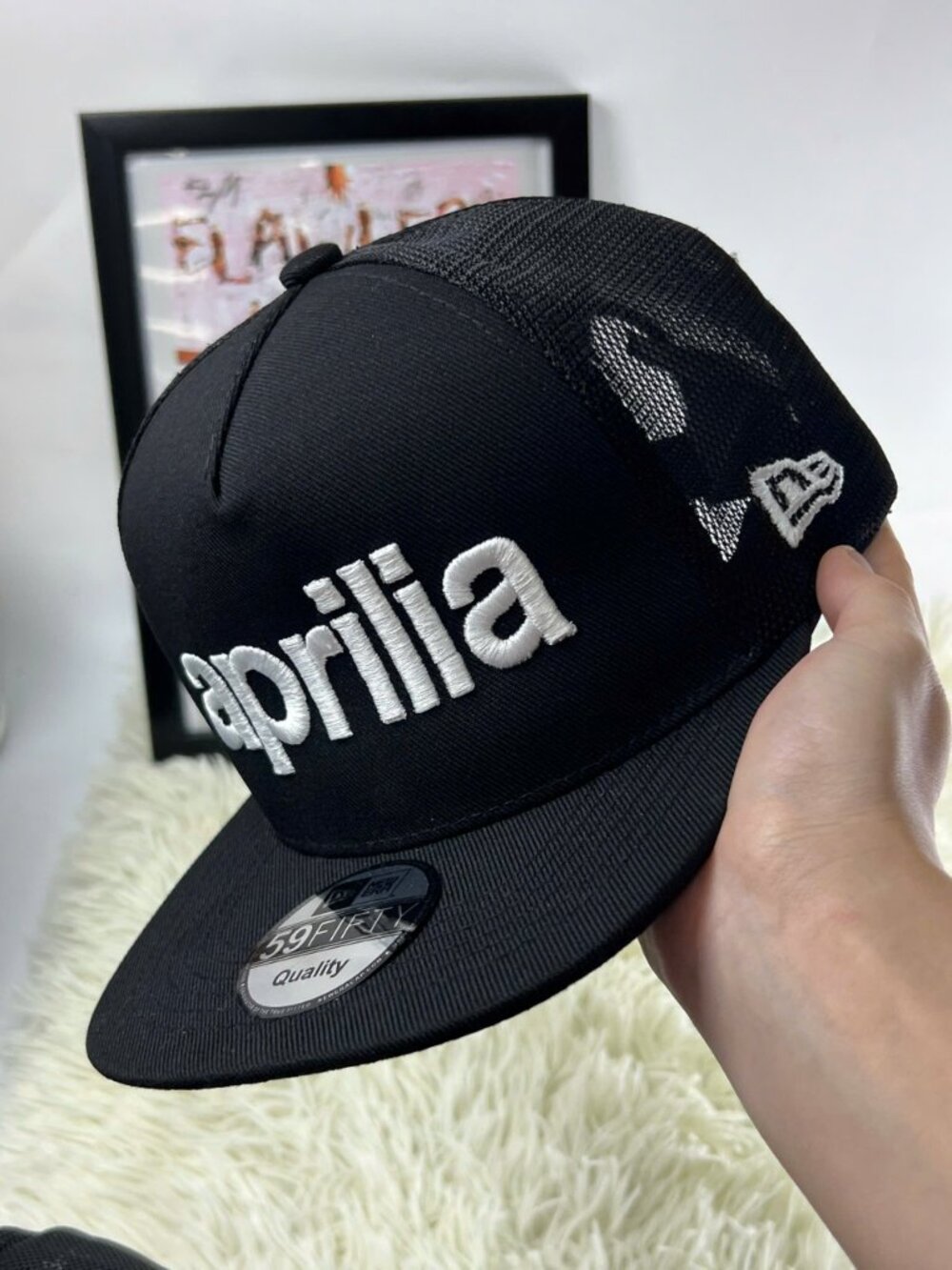 Aprilia Logo Embroidered New Era 59FIFTY Black Mesh Trucker Hat